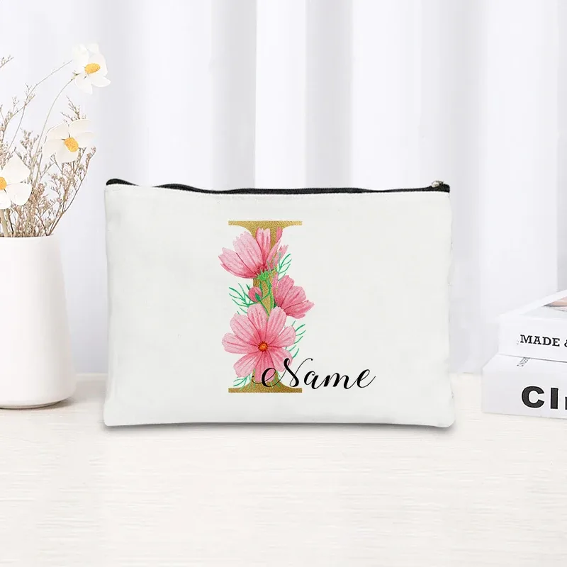 grande pochette zippée à motif floral rose et initiales dorées, organisateur d'essentiels de voyage en toile, trousse de maquillage pour enterrement de vie de jeune fille avec sac personnalisé avec nom.