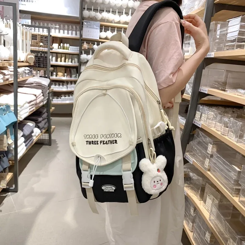sac à dos avec pendentif de dessin animé ins de style coréen, sac à main pour femmes, sac d'école de grande capacité pour étudiants, sac de transport et de voyage