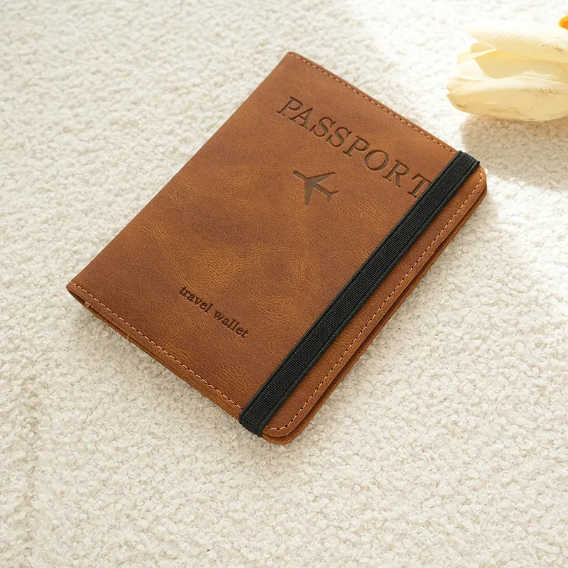 pochette de voyage rfid anti-électronique 2026, étui en cuir pu simple et élégant, porte-documents multifonctionnel, portefeuille de voyage