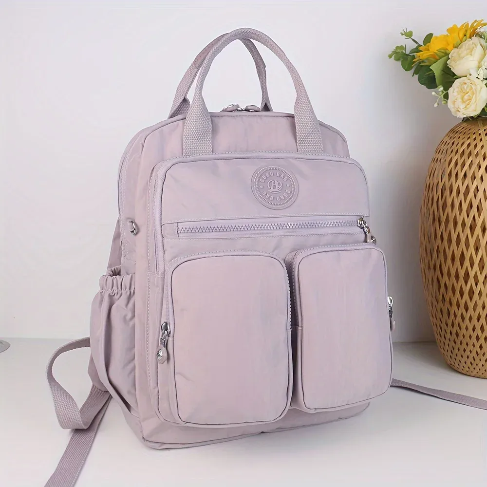 sac à dos d'école léger de grande capacité, sac de voyage multi-poches, matériau en nylon résistant à l'usure, bretelles confortables.
