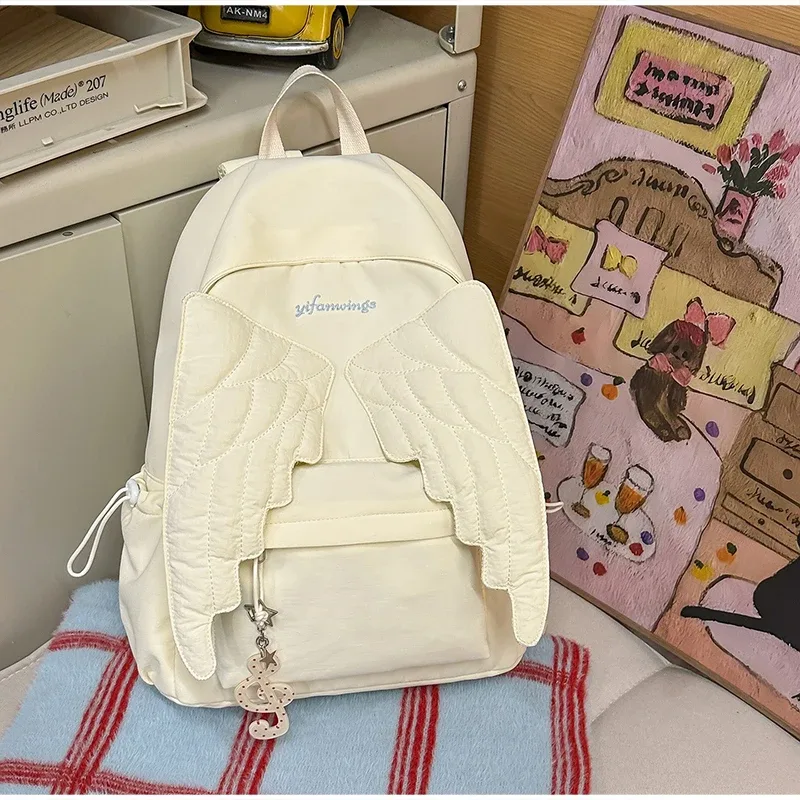 sac à dos matelassé ailes d'ange mignon, sac d'école en nylon à la mode, motif brodé élégant, sac à dos décontracté, sac de voyage quotidien spacieux