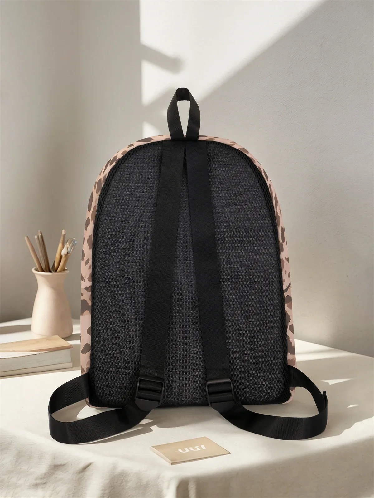 sac à dos à motif léopard et nœud, nouveau modèle 2025, sac à dos de voyage décontracté, léger et simple.