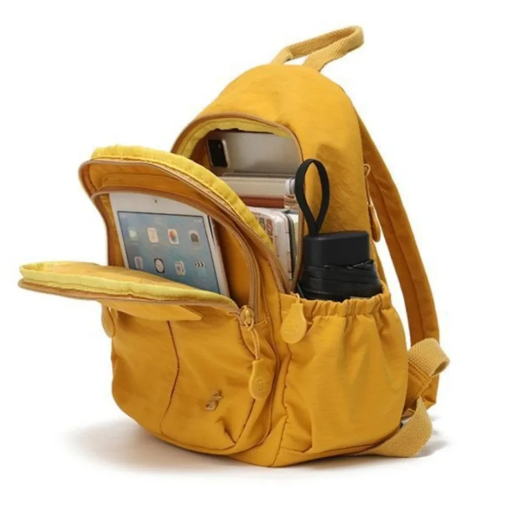 nouveau sac à dos léger et compact, minimaliste et tendance, résistant à l'eau, polyvalent pour les voyages, le sport, l'école et l'usage quotidien