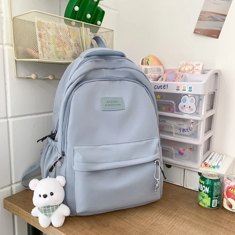 nouveau mode féminine hommes haute capacité étanche collège sac à dos à la mode femmes sacs d'école pour ordinateur portable mignon fille voyage livre sac cool