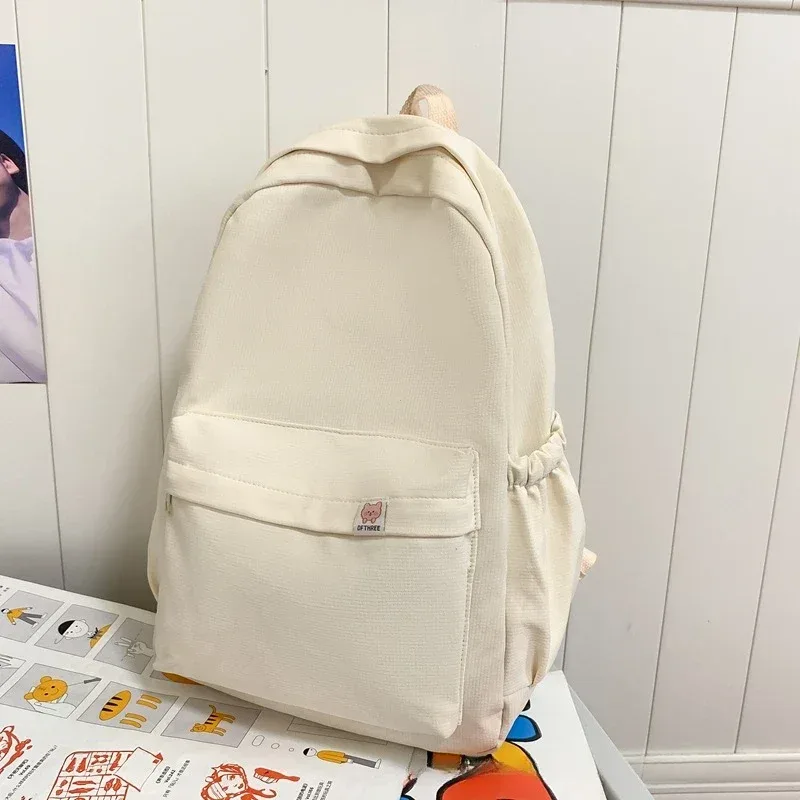 nouveau sac à dos imperméable en nylon pour femmes sac de voyage pour femmes sacs à dos cartable pour adolescentes couleur unie bookbag mochila bookbag