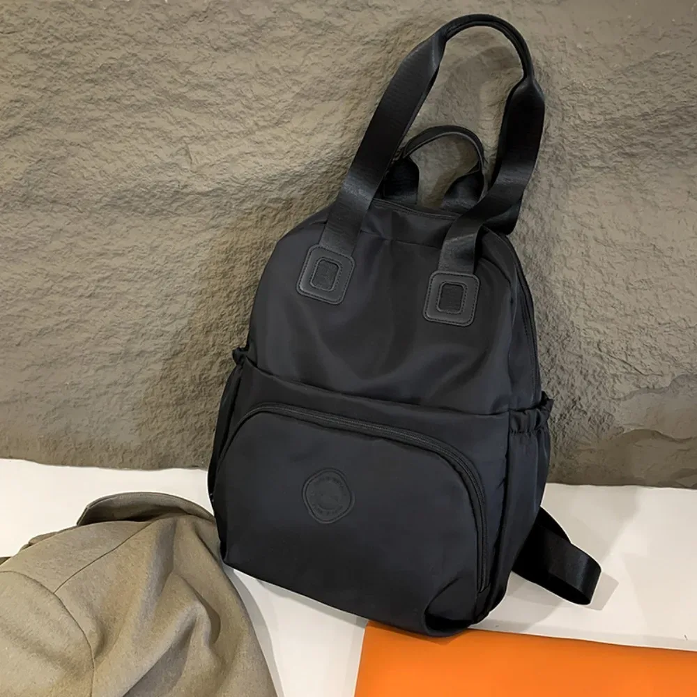 sac à dos sportif décontracté en nylon de style coréen, couleur unie, grande capacité, sac de voyage, sac à bandoulière, sac fourre-tout, sac de fitness en nylon, sac de voyage