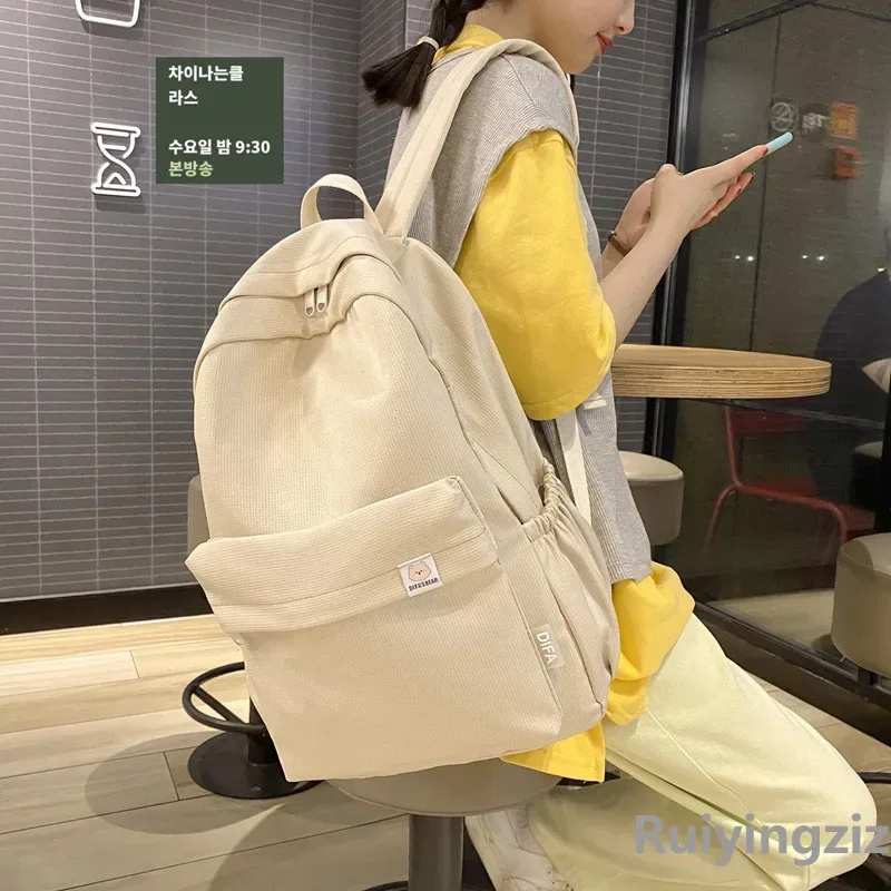 sac à dos élégant, design doux et simple, cartable à poches multiples, voyage, usage quotidien, accessoire de mode, vibrant, parfait, transport quotidien