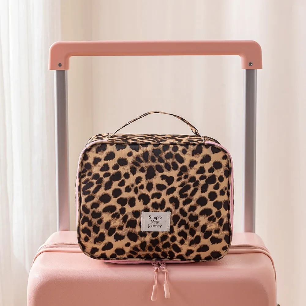 trousse de maquillage léopard grande capacité, organisateur de voyage imperméable pour cosmétiques, indispensable pour les voyages d'affaires et les bagages pour femmes