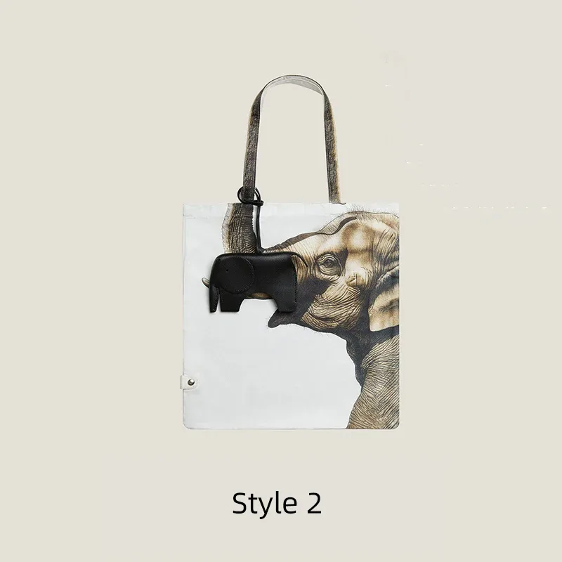 breloque de sac éléphant en peau de mouton avec pochette de rangement en soie, ornement décoratif 2-en-1 et organisateur pratique, accessoire en cuir