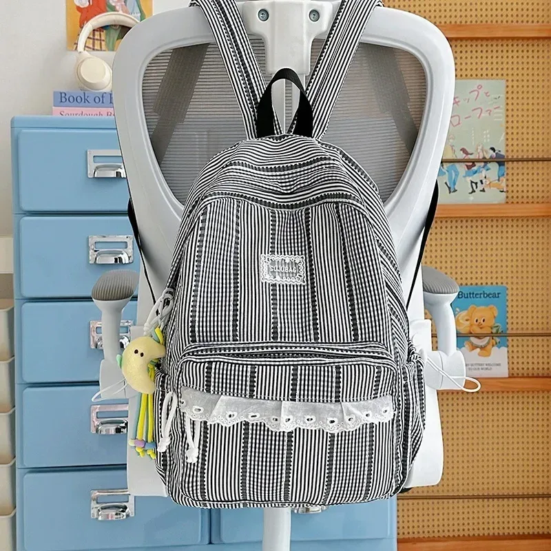 sac à dos coréen simple et esthétique en dentelle à volants, couleur unie, rayé, grande capacité, pour étudiantes, idéal pour l'école, les trajets quotidiens et les voyages