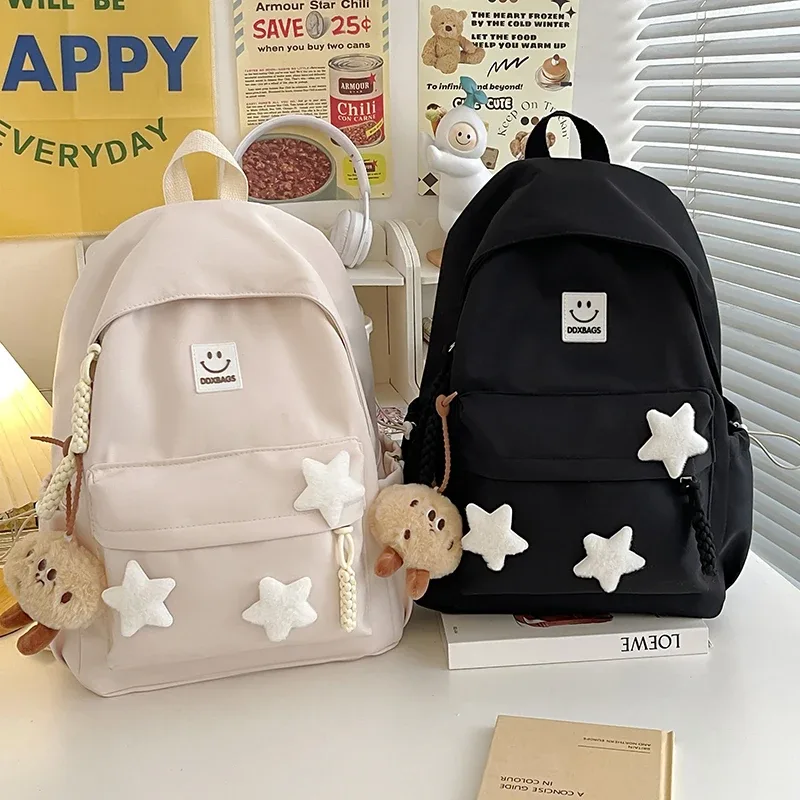 sac à dos rose mignon pour filles cartable à la mode décoré d'étoiles avec porte-clés en peluche parfait pour une utilisation quotidienne et l'école style adorable et tendance idéal pour adolescente