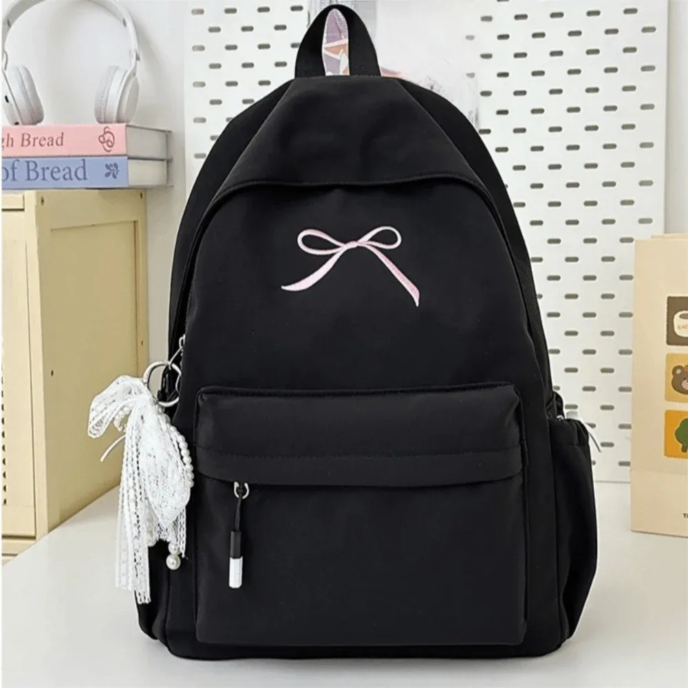 sac à dos portable avec nœud brodé pour filles, cartable en nylon de grande capacité pour étudiants, sac à dos de voyage léger de couleur unie