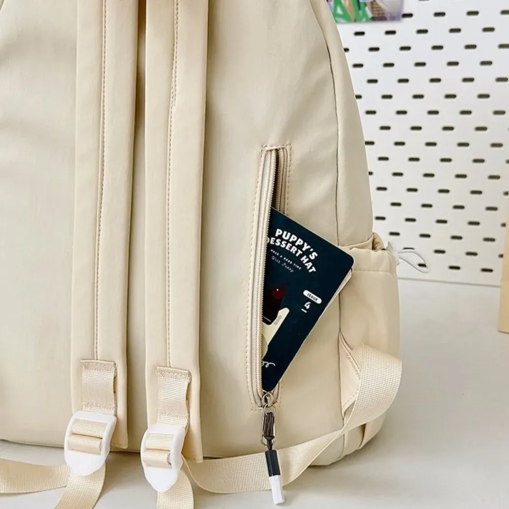 sac à dos portable avec nœud brodé pour filles, cartable en nylon de grande capacité pour étudiants, sac à dos de voyage léger de couleur unie