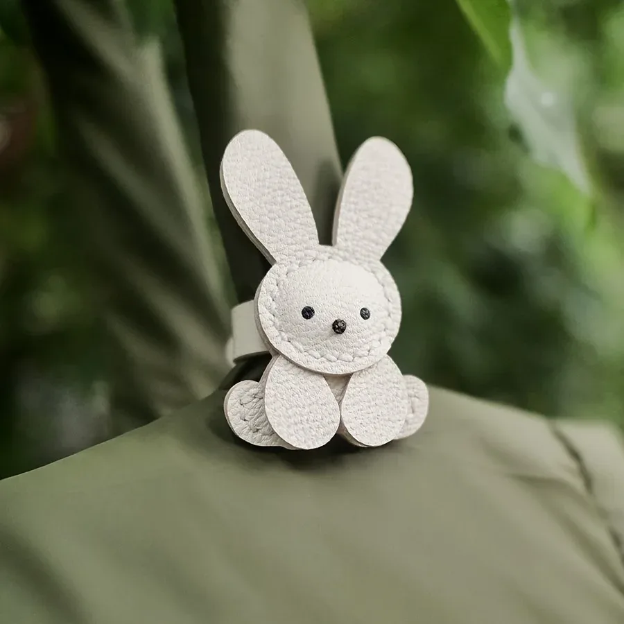 Breloque de sac en forme de lapin mignon, 1 pièce, simili cuir synthétique léger avec boucle en acier inoxydable, adorable motif de lapin pour sacs à dos
