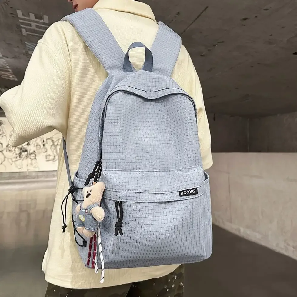sac à dos de voyage décontracté grande capacité pour homme, motif quadrillé simple, sac d'école en nylon, style campus jeune, système anti-gravité