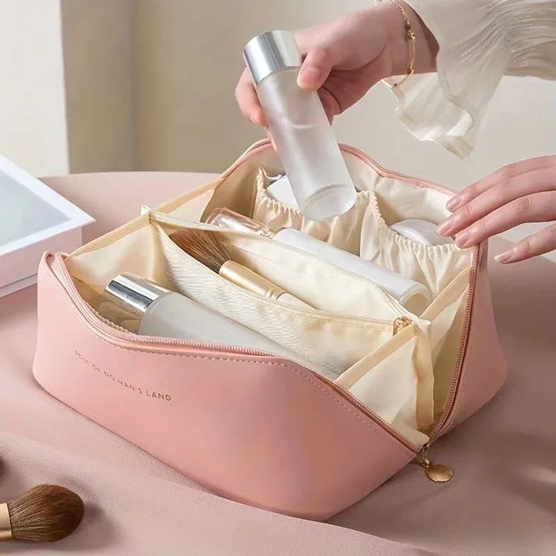 sac de maquillage pratique à la mode, sac de rangement de voyage en pu, trousse de toilette de grande capacité, sac de maquillage pour oreiller de beauté stimulant les mains