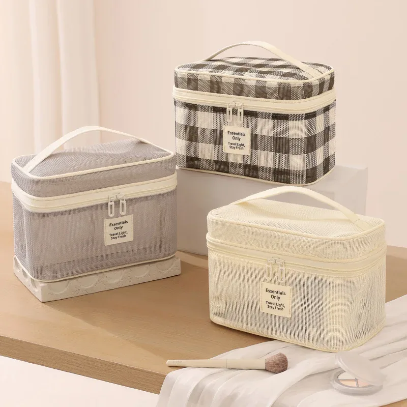 Sac de voyage cosmétique et de maquillage tendance avec fermeture éclair, motif lettres en maille, durable, grande capacité, portable, respirant et à compartiments
