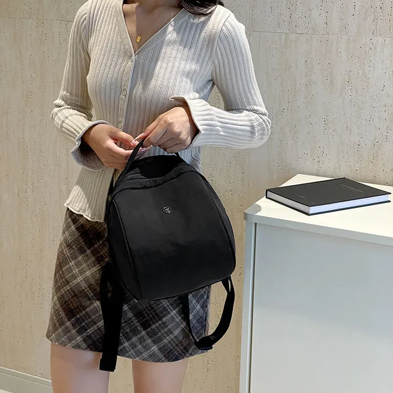 nouveau petit sac à dos de banlieue en plein air voyage décontracté simple sac à main pour femmes grande capacité couleur unie double sacs à bandoulière