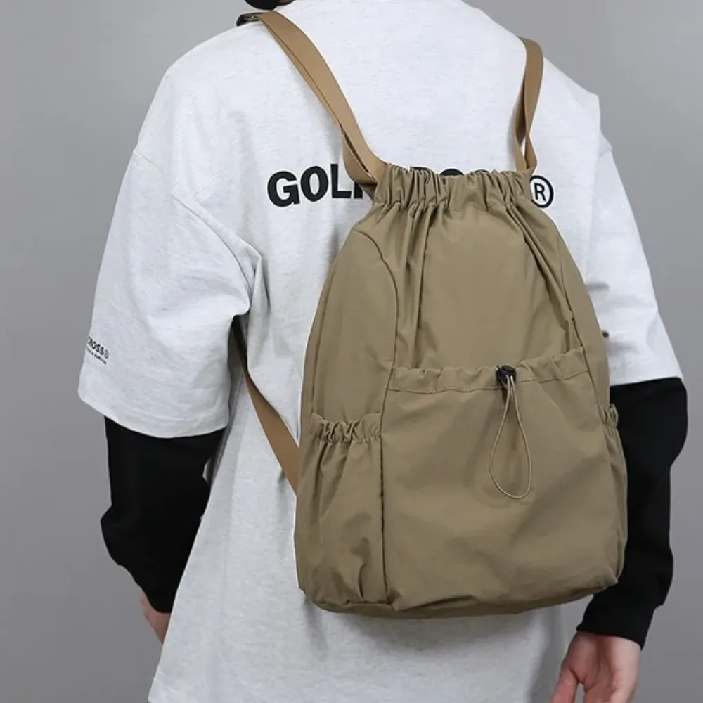 sac à dos de voyage décontracté de couleur unie, léger, de style coréen, avec cordon de serrage, grande capacité, pliable, cartable de sport pour étudiants