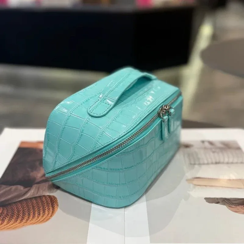 nouvelle trousse de maquillage en cuir véritable, motif crocodile, grande capacité, série de couleurs haut de gamme, sac de toilette portable de voyage