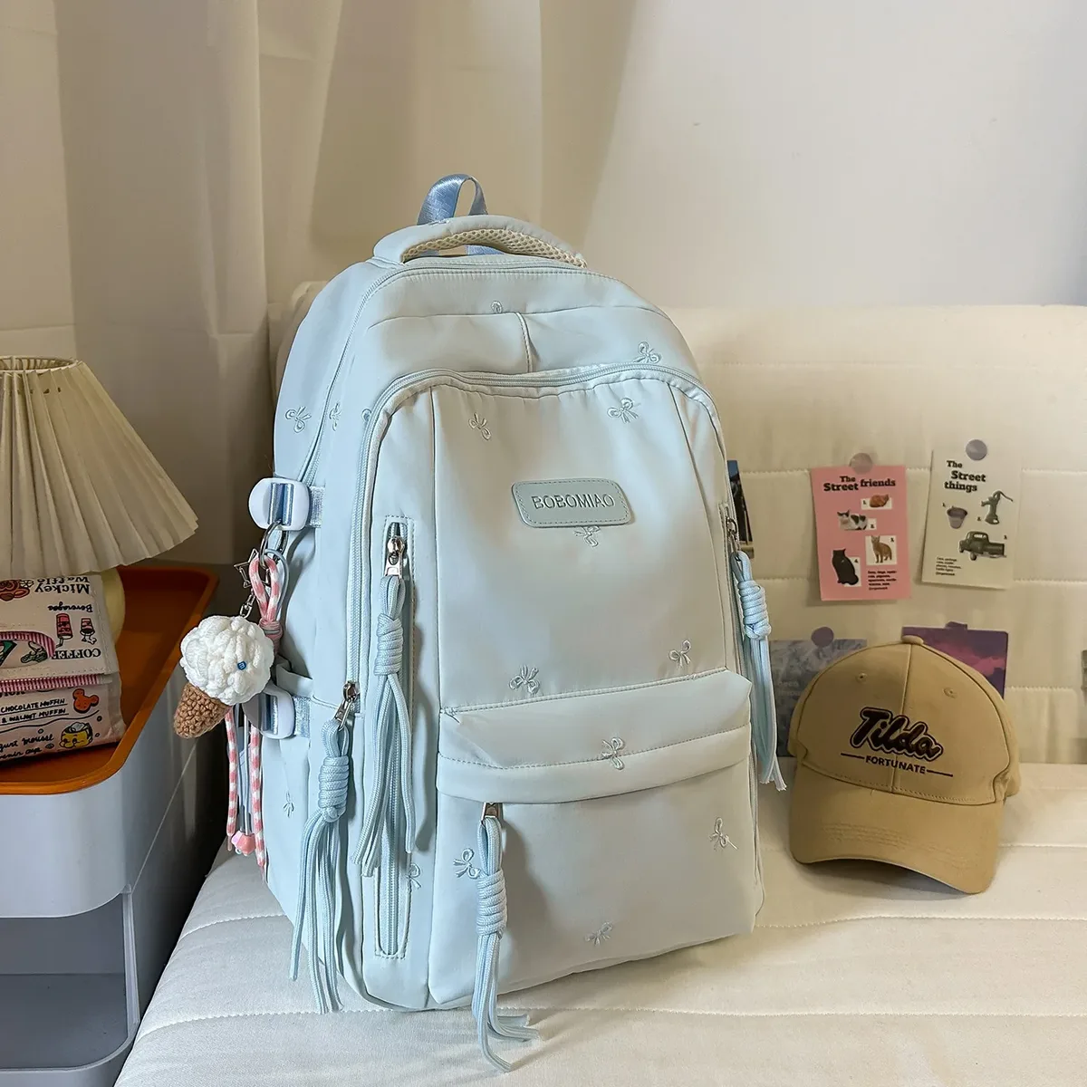 sac à dos traveasy 2026 nouveau motif nœud mignon polyvalent en nylon avec pendentif pompon protection dorsale pour étudiants