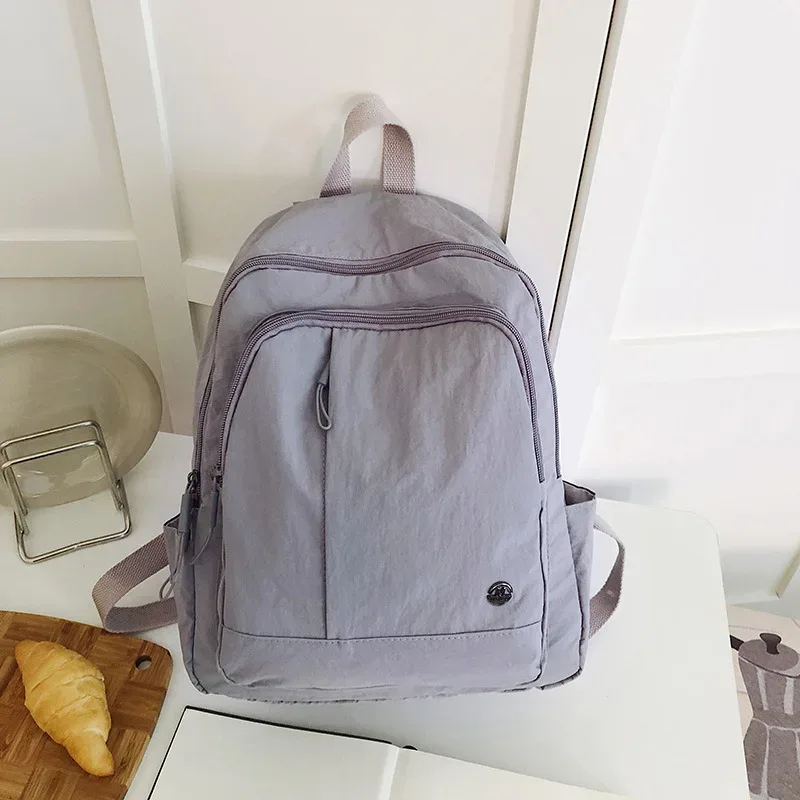 sac à dos décontracté pour femmes, léger et étanche, sac de voyage de grande capacité pour femmes, sac à dos d'école pour filles