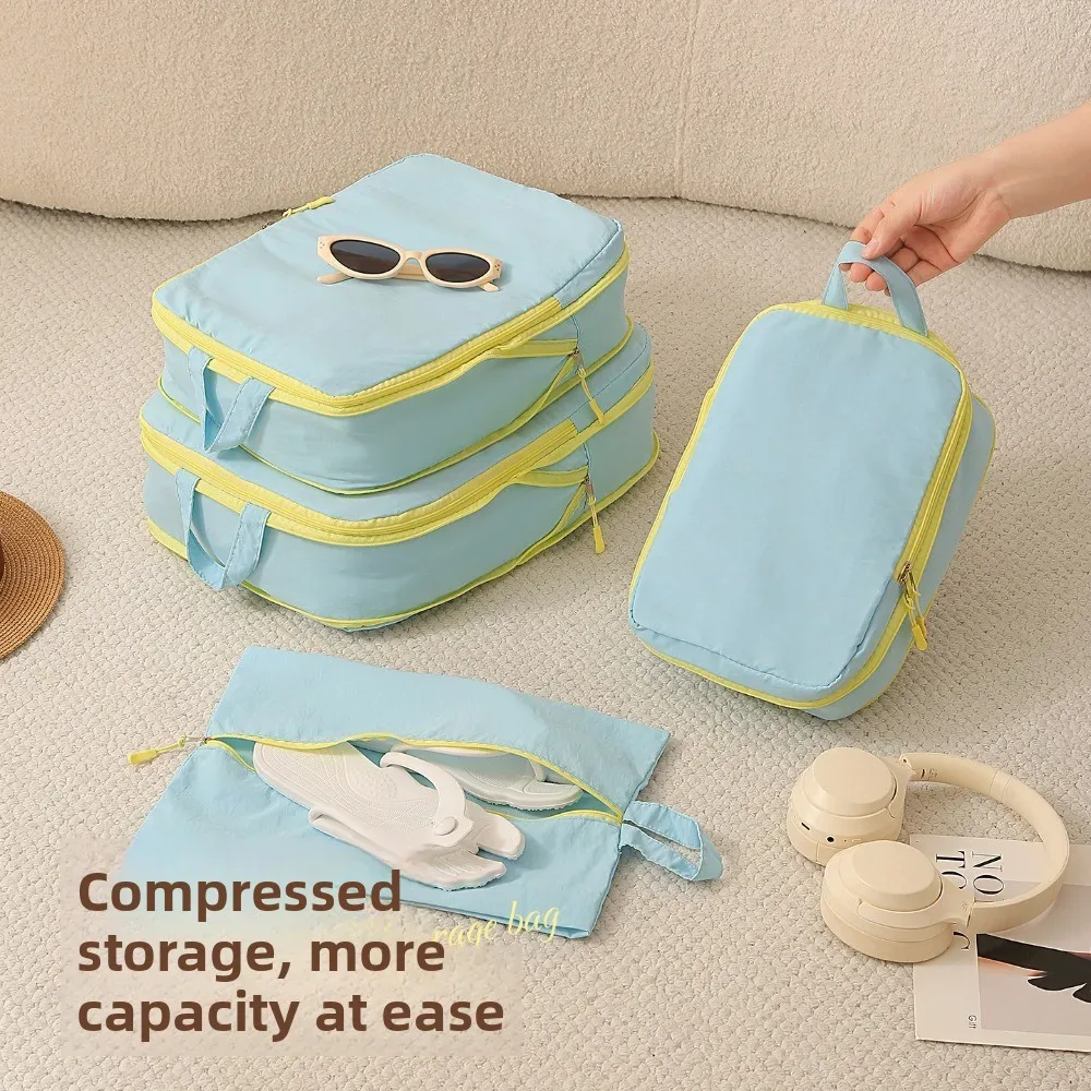 cubes de rangement taslan jaunes, ensemble de quatre pièces, organisateur de bagages à compression pour gagner de la place avec sac à chaussures pour les voyages en cabine et les vacances