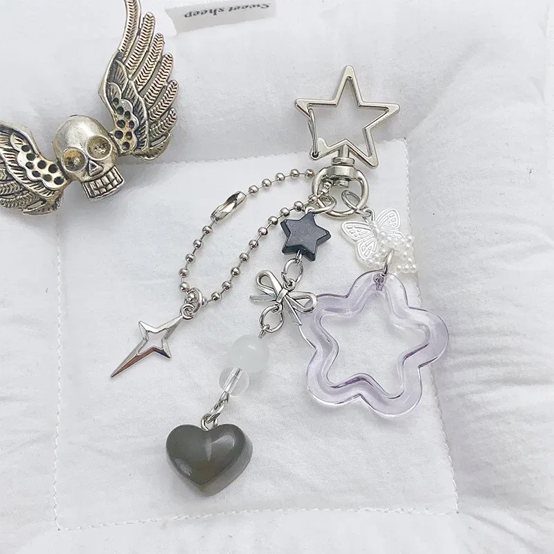 charmant porte-clés avec nœud en forme d'étoile et de cœur, parfait pour les femmes ; clé de voiture pour filles, cadeaux de décoration pour sac à dos