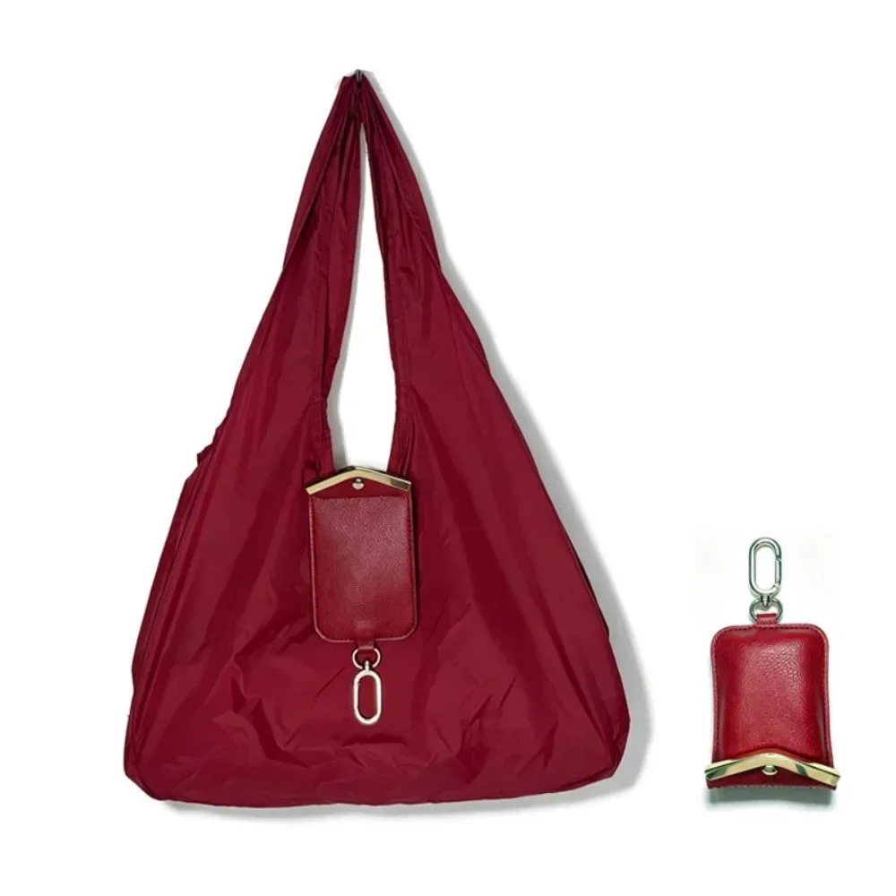 sac fourre-tout mini pliable anti-déchirure en similicuir couleur unie avec porte-clés, pochette 2-en-1 et breloque de sac, gain de place