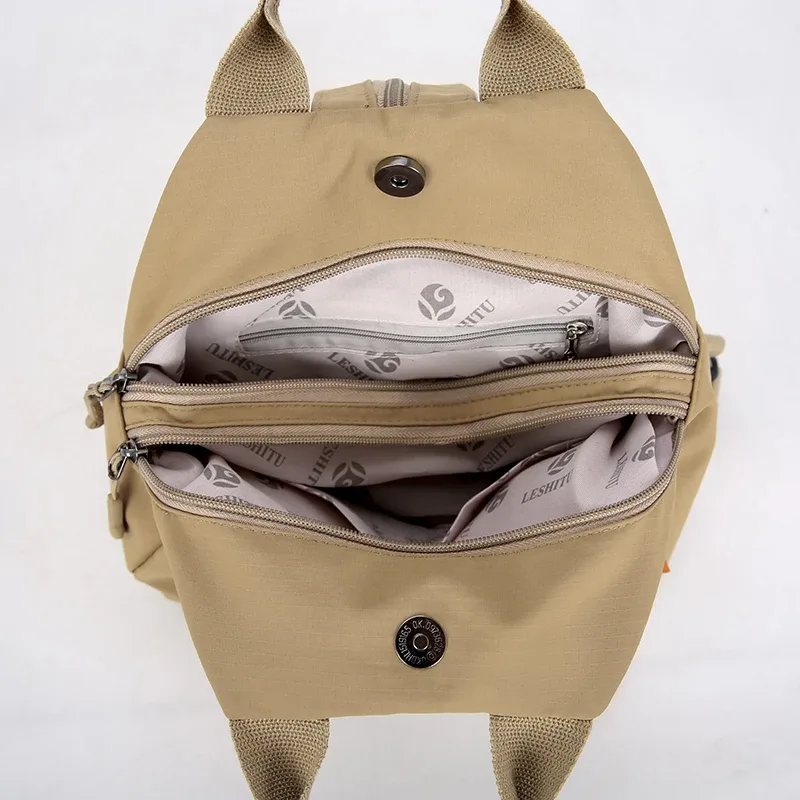 sac à dos léger et résistant à l'eau pour femme, durable, avec plusieurs poches, idéal pour les trajets quotidiens, les étudiants et les voyages