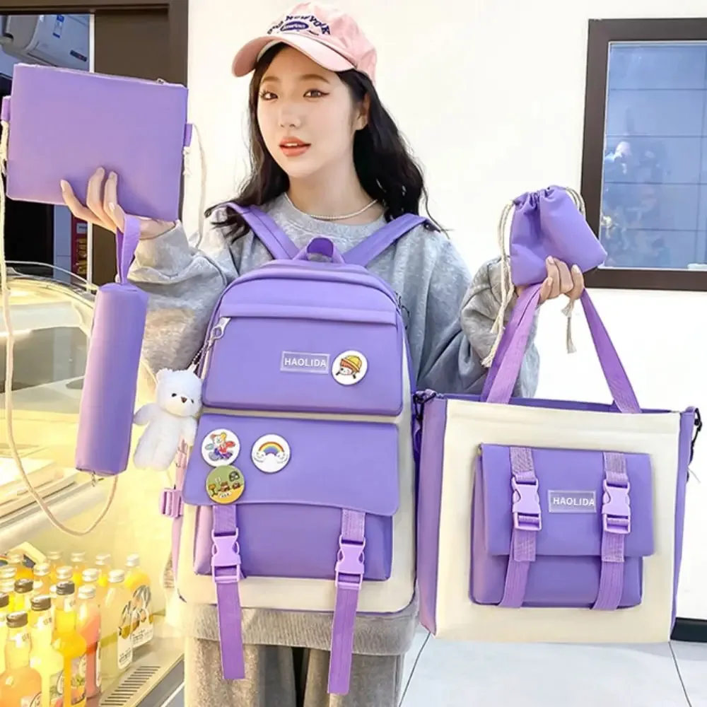 sacs décontractés en nylon de grande capacité, sac à dos à bandoulière avec badge de trajet simple, un ensemble de quatre cartables, sac d'école de style coréen pour enfants