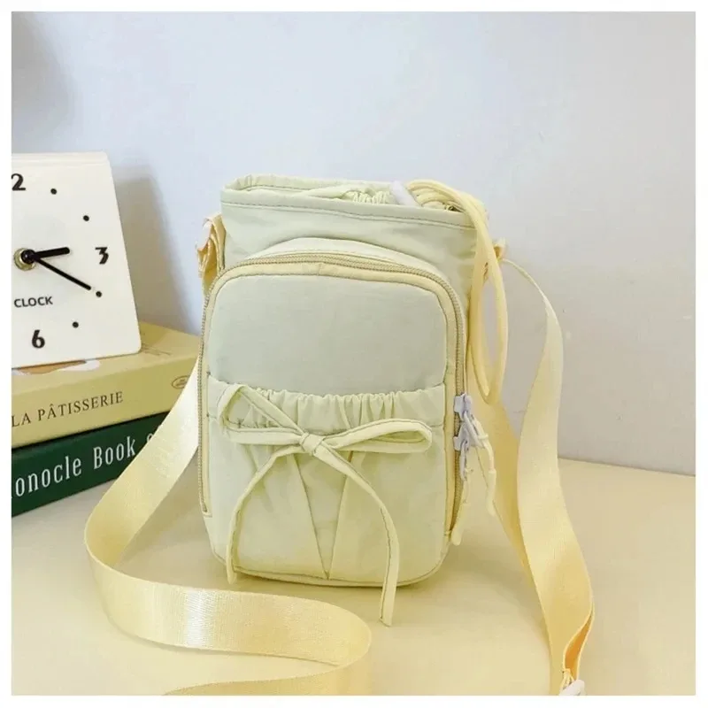 nouveau sac bandoulière léger pour téléphone portable pour femme, sac de sport extérieur, sac de cyclisme, porte-bouteille d'eau, sac de voyage, design à nœuds