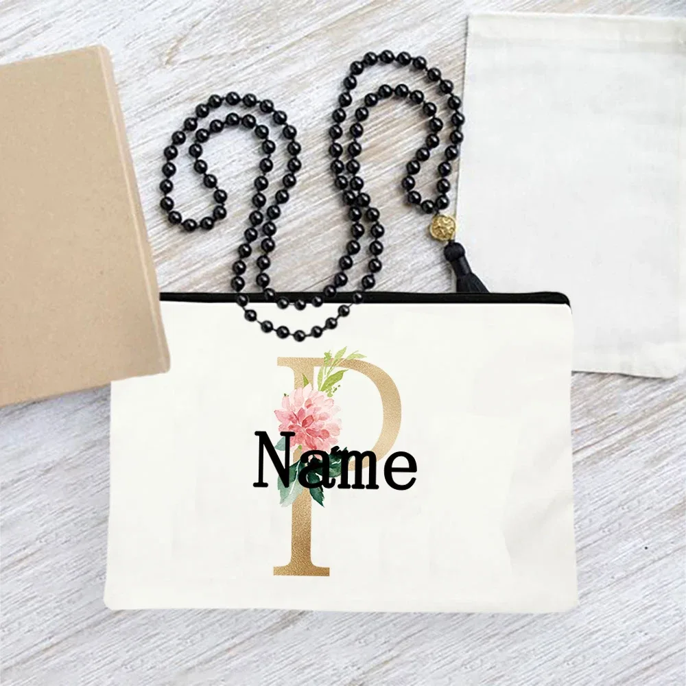 pochette en toile personnalisée avec initiales florales dorées, trousse de toilette légère personnalisée avec monogramme pour femmes, idéale pour les voyages quotidiens.