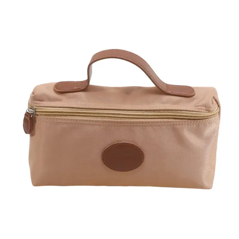 nouvelle trousse de maquillage portable 2026, sac cosmétique à main grande capacité en nylon, trousse de toilette de voyage pour femme, sac de rangement de voyage