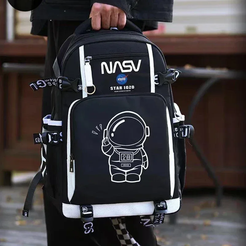 sac à dos d'étudiant spaceman imprimé fluorescent, sac à dos imperméable en tissu oxford avec bandoulière souple, sac de grande capacité à la mode