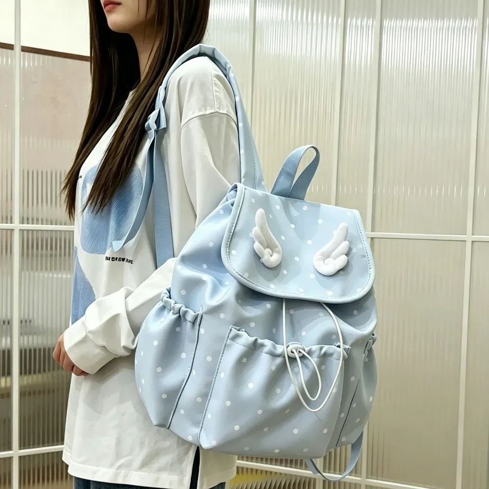 sac à dos à cordon de serrage imprimé à pois, fermeture à cordon, design à rabat, sac à dos pour livres, décor ailes d'ange, style décontracté