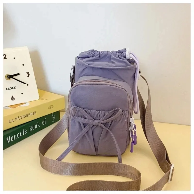 nouveau sac bandoulière léger pour téléphone portable pour femme, sac de sport extérieur, sac de cyclisme, porte-bouteille d'eau, sac de voyage, design à nœuds