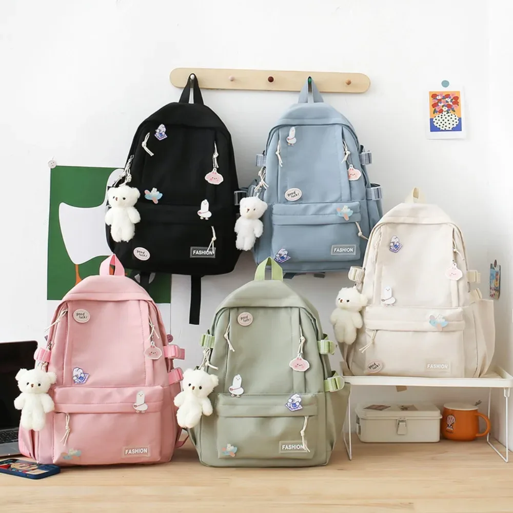 Nouveau sac d'école de grande capacité, sac de voyage portable à sangle réglable, sac à dos léger en toile de couleur unie, unisexe