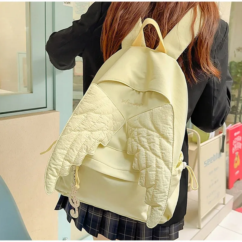 sac à dos matelassé ailes d'ange mignon, sac d'école en nylon à la mode, motif brodé élégant, sac à dos décontracté, sac de voyage quotidien spacieux