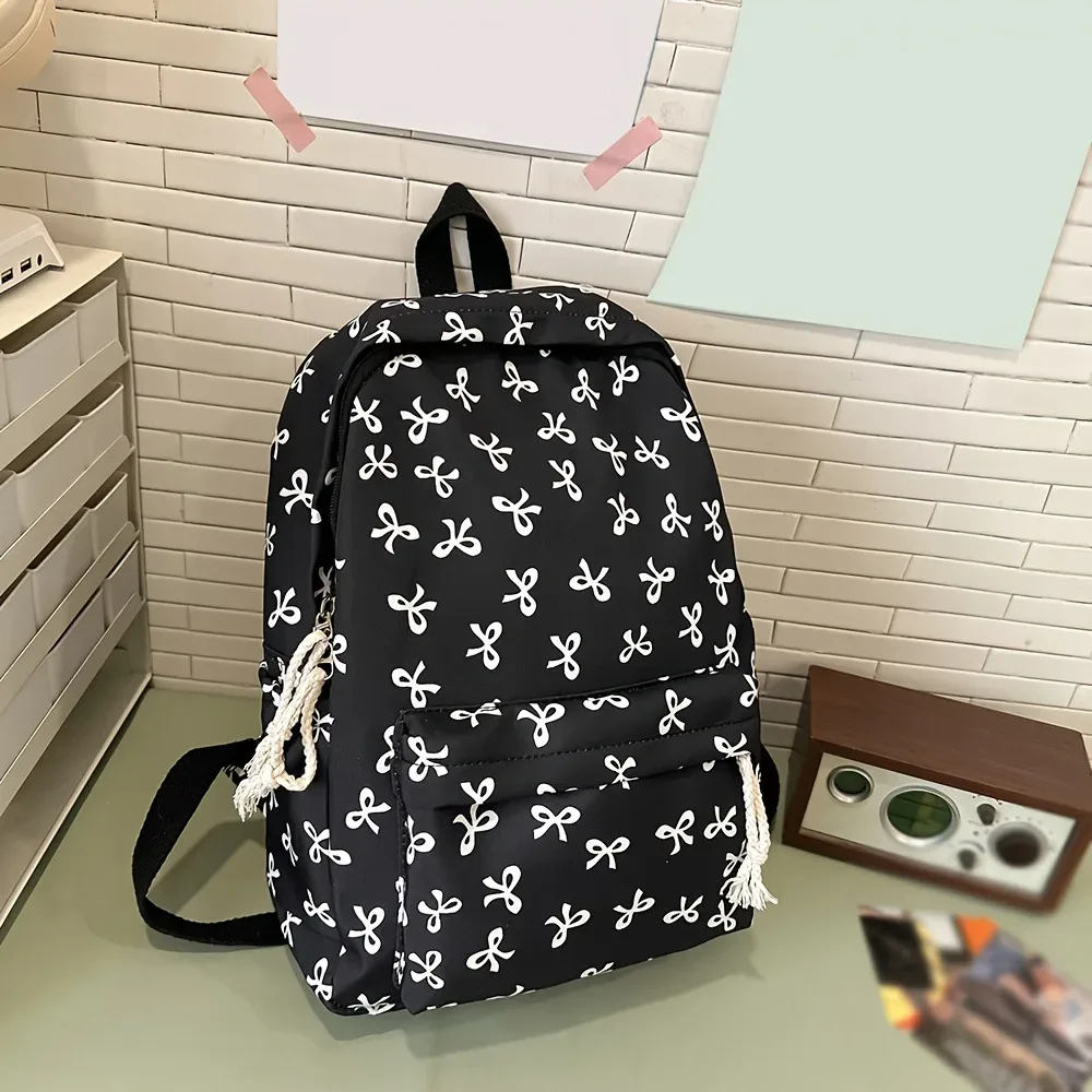 sac à dos tendance et mignon à imprimé nœud pour femme, compartiment pour ordinateur portable avec bretelles réglables, sac idéal pour la rentrée scolaire et les voyages sur le campus