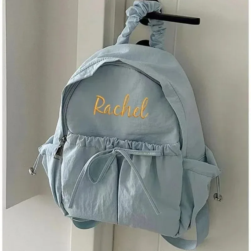 Nom brodé personnalisé Simple polyvalent cordon arc sac à dos grande capacité sac à dos voyage scolaire pour cadeaux sac à dos