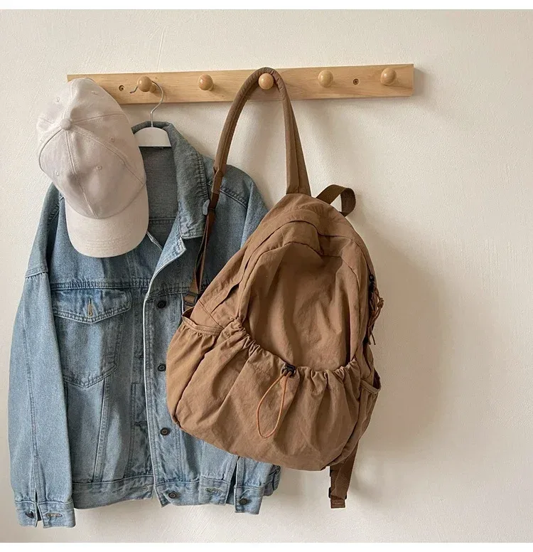 2025 sac à dos décontracté femmes grande capacité mode junior lycée étudiant pli cartable sac en tissu coréen voyage sac à dos