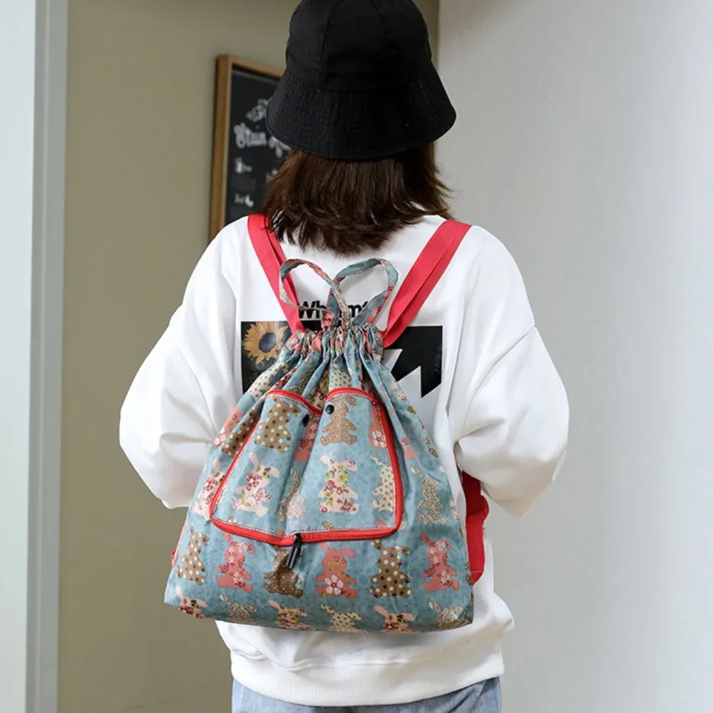 Sac à cordon léger et décontracté, sac de courses multifonctionnel à motif animal, sac à dos pliable en nylon à motif floral pour le voyage