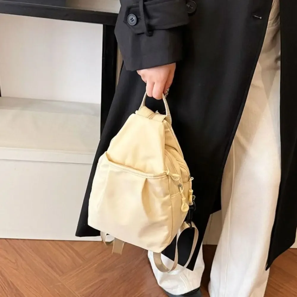 Sac à dos en tissu Oxford uni, léger, grande capacité, sac bandoulière décontracté, sac à dos de voyage léger en nylon