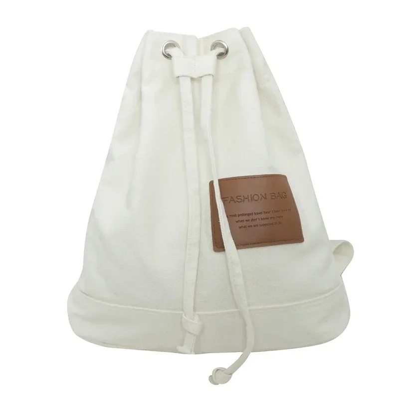 sac d'école solide décontracté, sac à dos en toile à la mode, sac à dos de grande capacité pour les déplacements, sac de voyage pour étudiants, nouvelle collection 2026