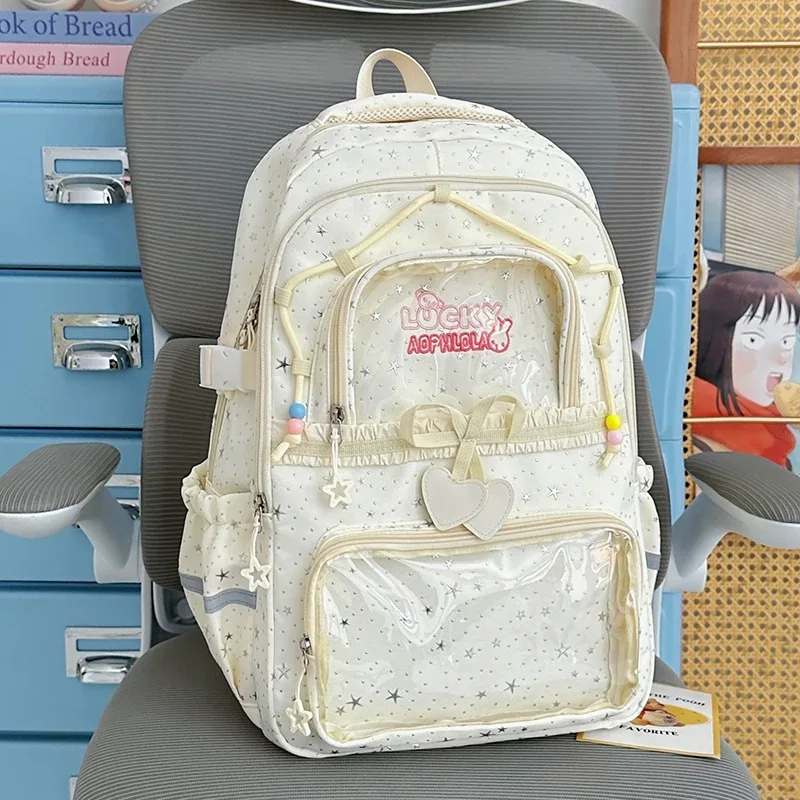 sac à dos pour femmes, sac de voyage multi-poches, joli sac d'école à rayures réfléchissantes avec nœud et étoiles pour adolescentes, sac à livres