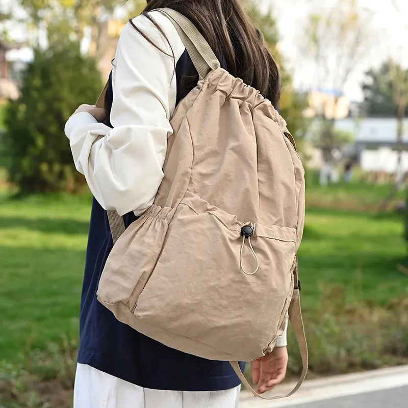 sac à dos léger et tendance avec cordon de serrage : sac de sport imperméable de grande capacité pour l'école, les livres, les activités de plein air, les voyages