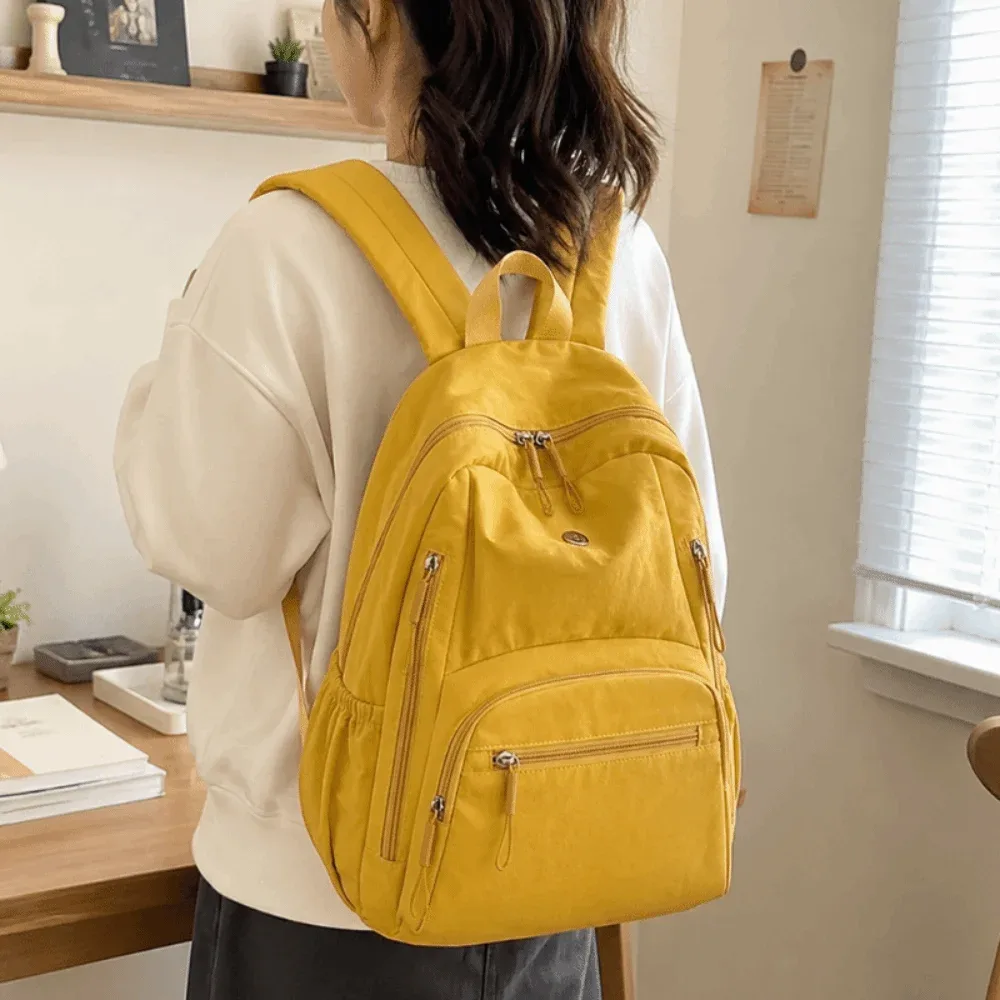 Sac à dos décontracté en nylon grande capacité, léger et durable, pour l'école, les voyages, couleur unie, imperméable, pour ordinateur portable, idéal pour la gym
