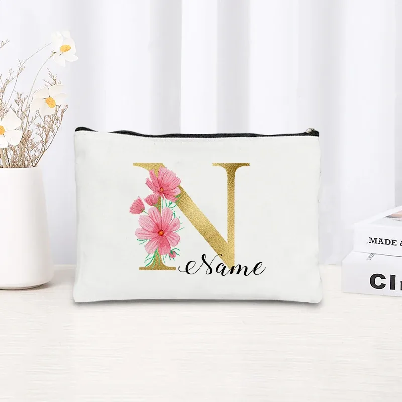 grande pochette zippée à motif floral rose et initiales dorées, organisateur d'essentiels de voyage en toile, trousse de maquillage pour enterrement de vie de jeune fille avec sac personnalisé avec nom.