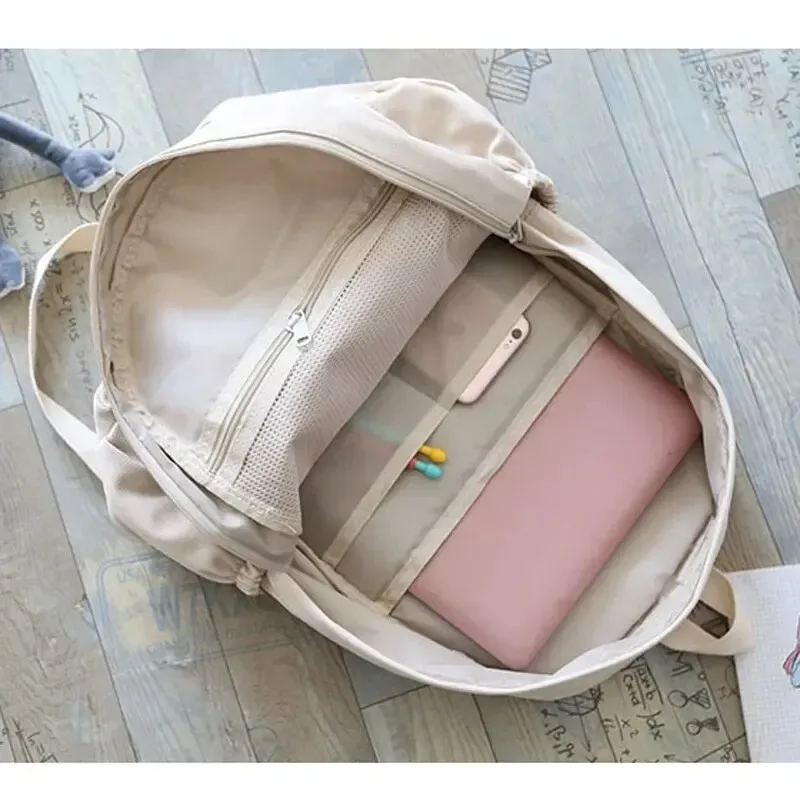 nouveau sac à dos imperméable en nylon pour femmes sac de voyage pour femmes sacs à dos cartable pour adolescentes couleur unie bookbag mochila bookbag